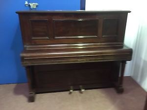 Upright Traditional Chappell Piano.