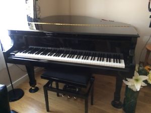 black samick grand piano