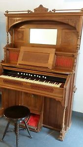 1901 Kimball Organ that still plays and is in good condition, stool included.