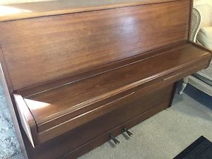 A Broad wood Upright Piano In Worcestershire
