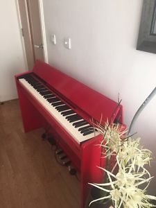 Roland F-120R digital piano In red barely used