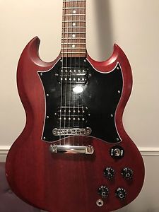 2015 studio satin finish Gibson SG electric guitar, new for $1000, comes w/ case