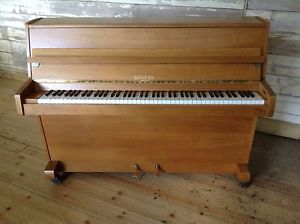 Rogers modern upright piano. Reconditioned and case refinished. School model.
