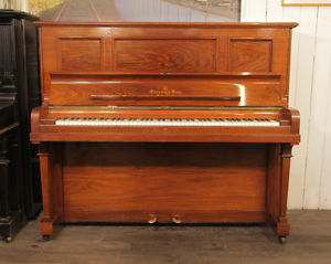 Reconditioned, 1901, Steinway vertegrand upright piano with a rosewood case.