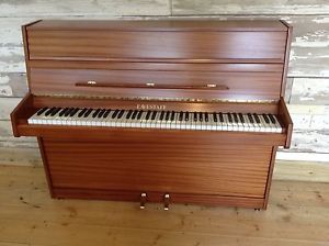 Eavestaff modern upright piano. Reconditioned throughout and case refinished.