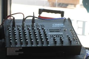 Crate 8 channel board, speakers, stands,cords, and monitor.