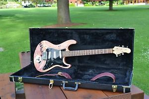 Hand Carved Guitar. Done by well known Canadian Artist. Beautiful instrument