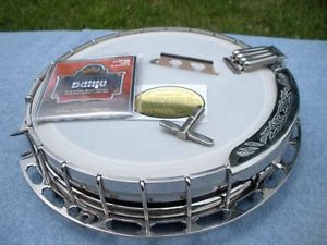 4 hole Gibson archtop tonering on COMPLETE 3 ply banjo rim assembly,