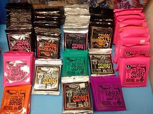 STOCK DE 98 JEU DE CORDES ERNIE BALL Slinky, cobalt, Hybrid, etc..
